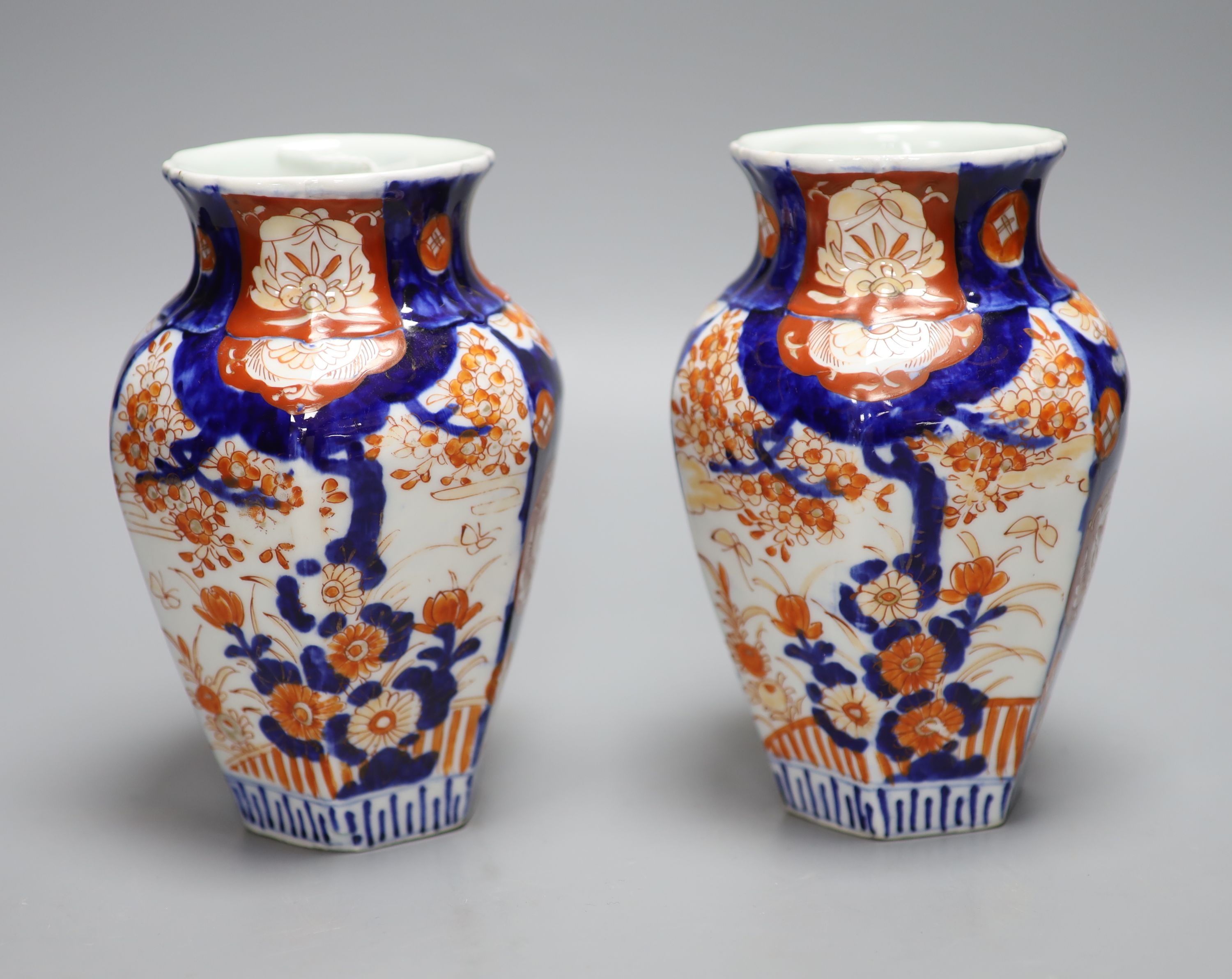 A pair of Japanese Imari vases, height 19cm
